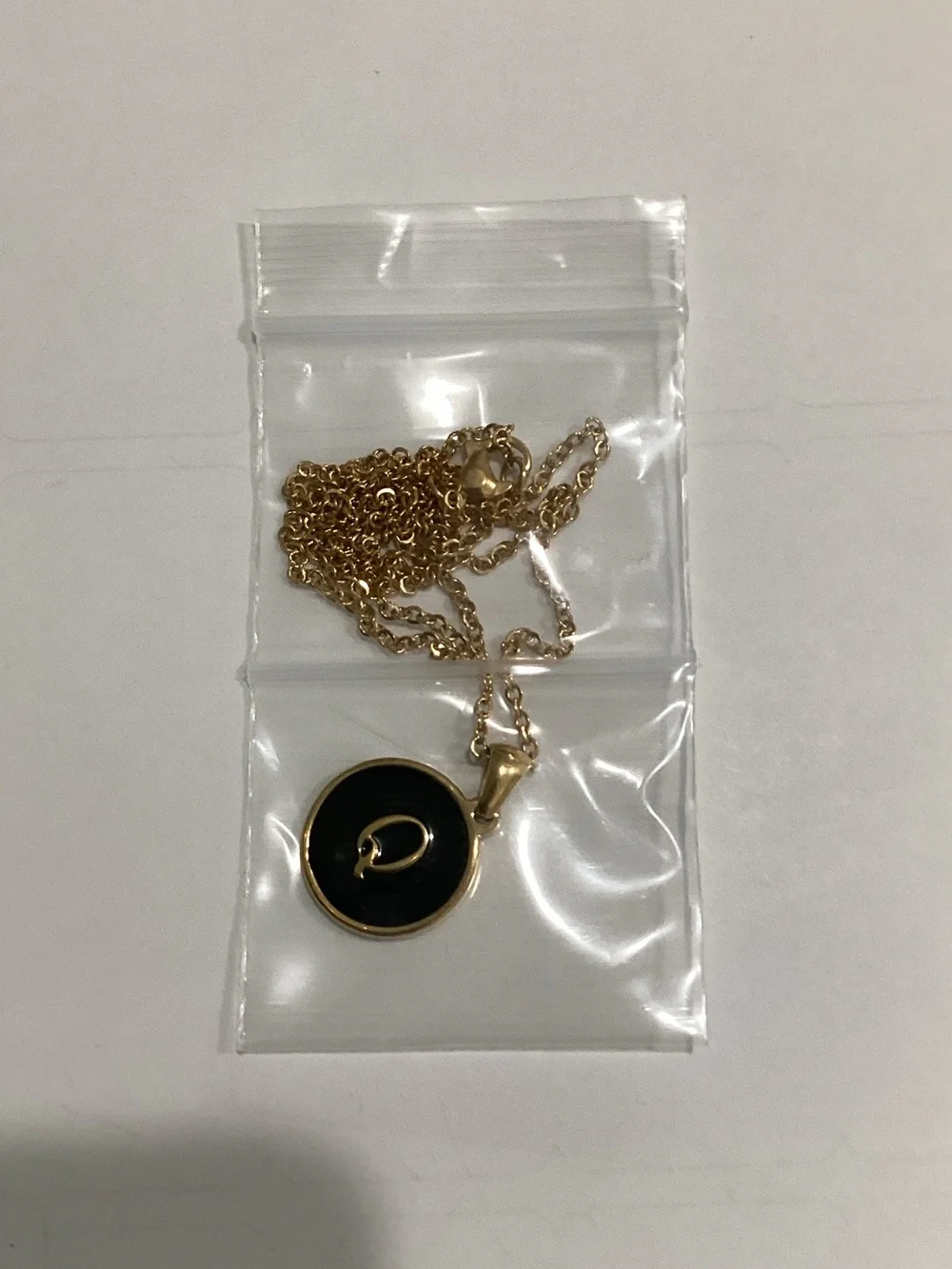 Gold Tone Black Pendant Necklace